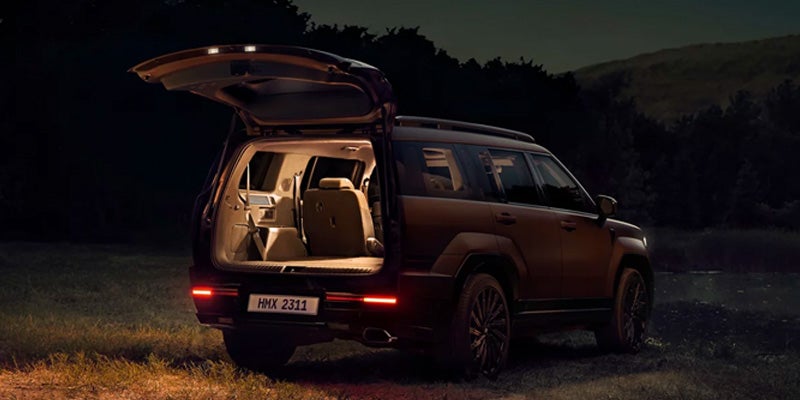 Hyundai Santa Fe parked on mountain roadside at night